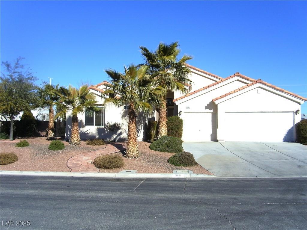 view of front of property with a garage