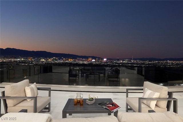 patio terrace at dusk with an outdoor hangout area