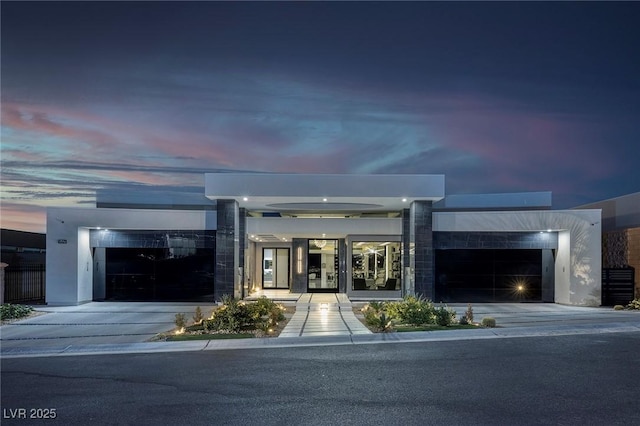 view of front of property featuring a garage