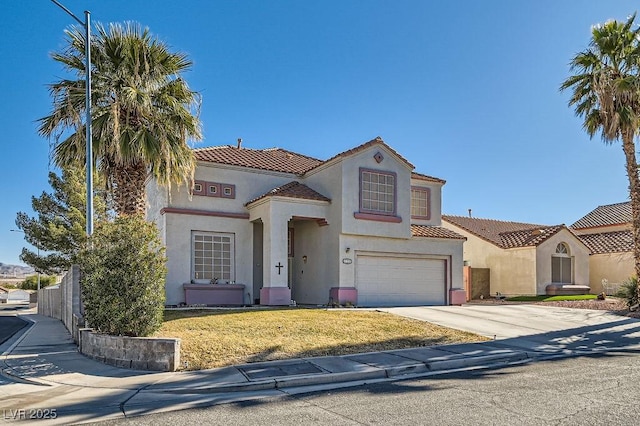 mediterranean / spanish home featuring a garage, a tile roof, concrete driveway, stucco siding, and a front yard