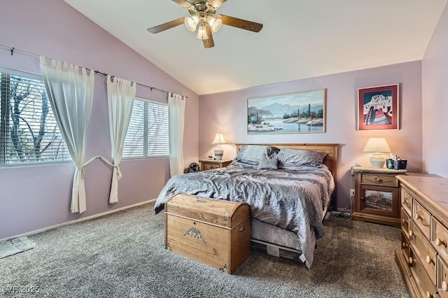 carpeted bedroom featuring ceiling fan and vaulted ceiling