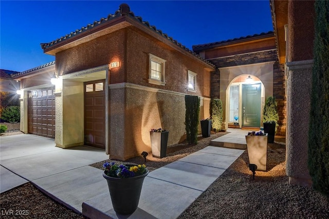 exterior space with a garage