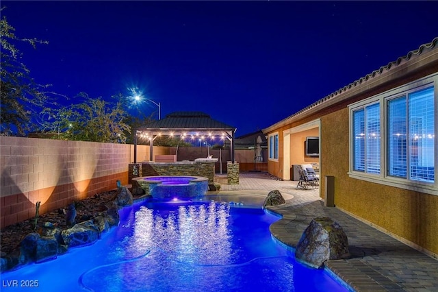 view of swimming pool featuring an in ground hot tub, a patio area, a gazebo, and pool water feature