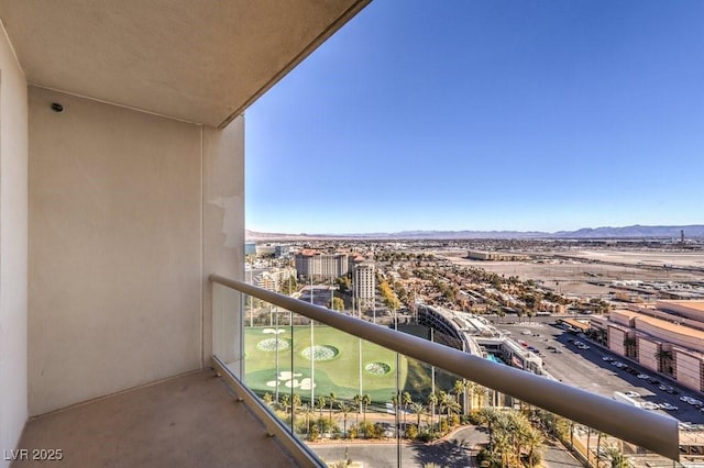 balcony featuring a mountain view