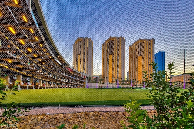 view of home's community featuring a lawn