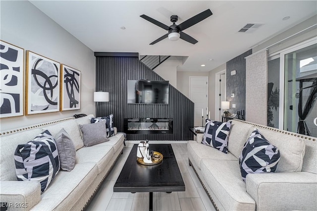 living room with ceiling fan