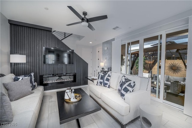 living room featuring ceiling fan