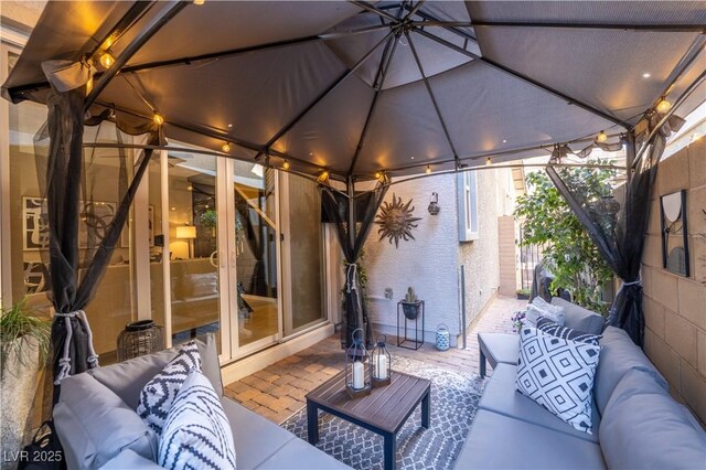 view of patio / terrace featuring a gazebo and an outdoor living space