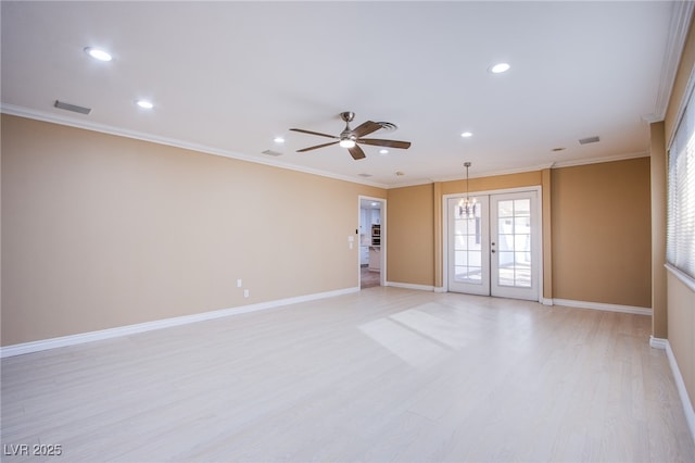 empty room featuring ceiling fan, french doors, crown molding, and light hardwood / wood-style flooring