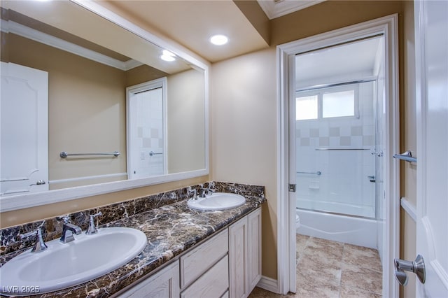 full bathroom with toilet, ornamental molding, enclosed tub / shower combo, and vanity