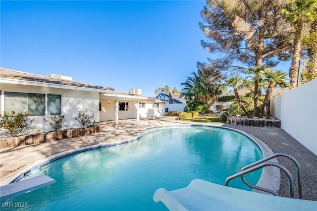 view of pool featuring a patio