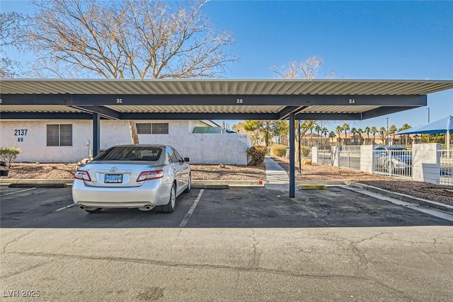 view of parking featuring a carport