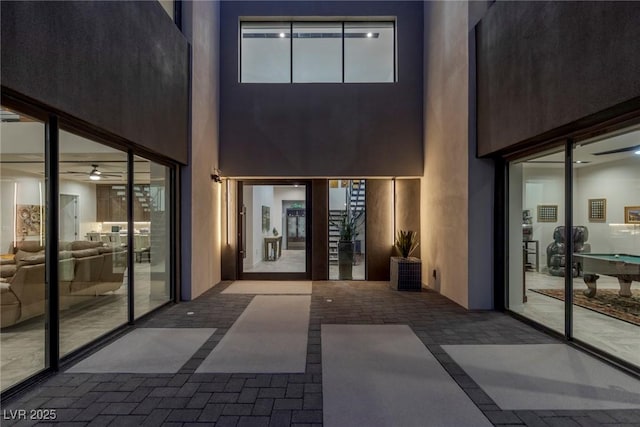 entrance to property featuring a patio