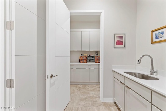 pantry with a sink