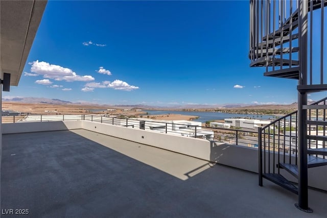 view of patio / terrace featuring a mountain view