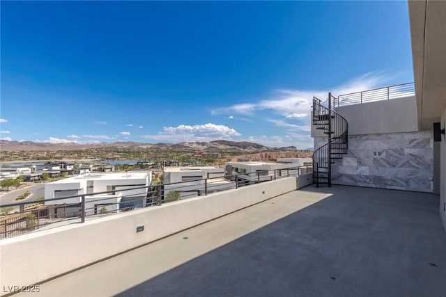 view of patio / terrace featuring a mountain view