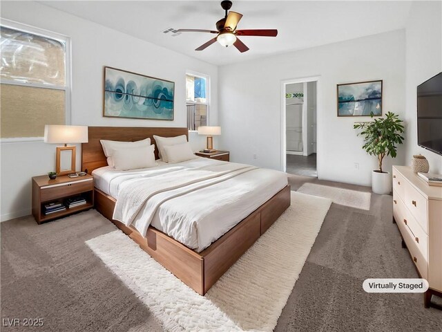 bedroom with ceiling fan and light colored carpet