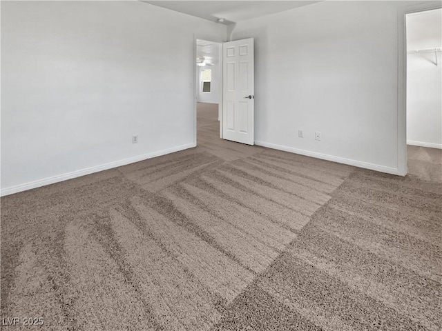 spare room featuring carpet