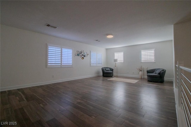 unfurnished room featuring dark hardwood / wood-style floors