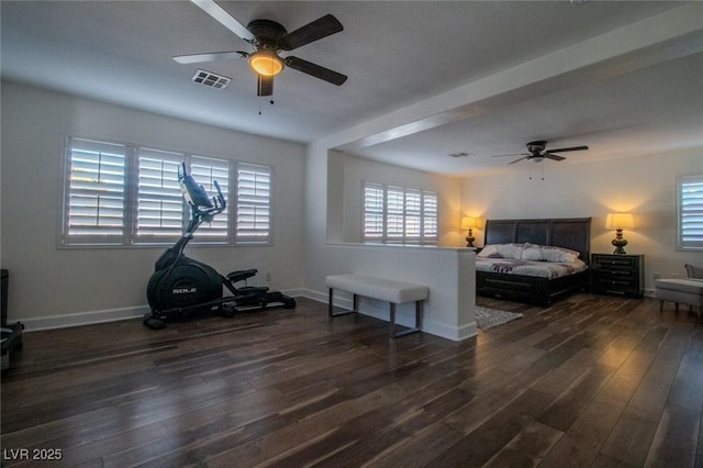 bedroom featuring ceiling fan and dark hardwood / wood-style flooring