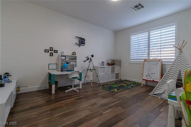 rec room with dark wood-type flooring