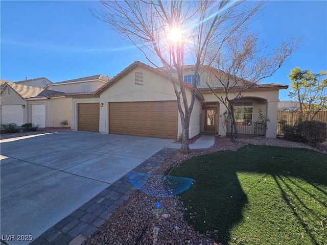 view of front of home with a garage, a porch, and a front lawn