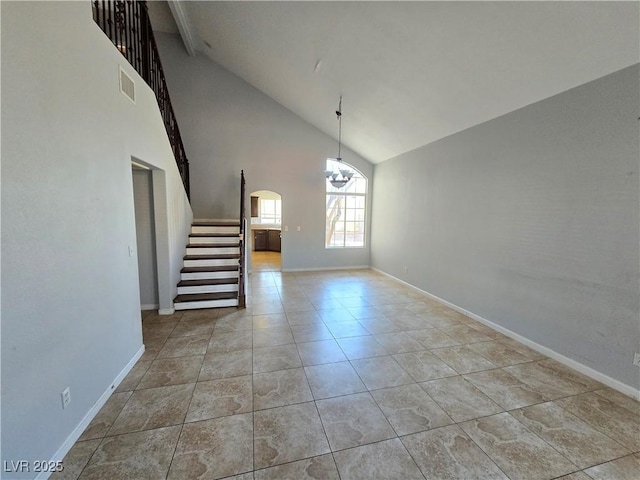 interior space featuring high vaulted ceiling