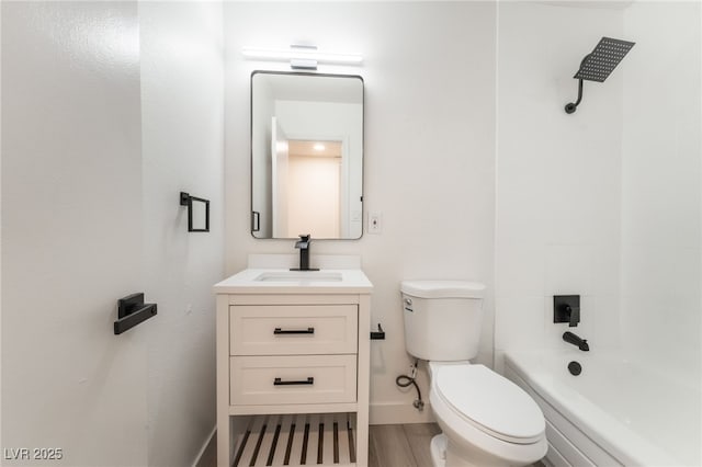 full bathroom with toilet, bathing tub / shower combination, and vanity