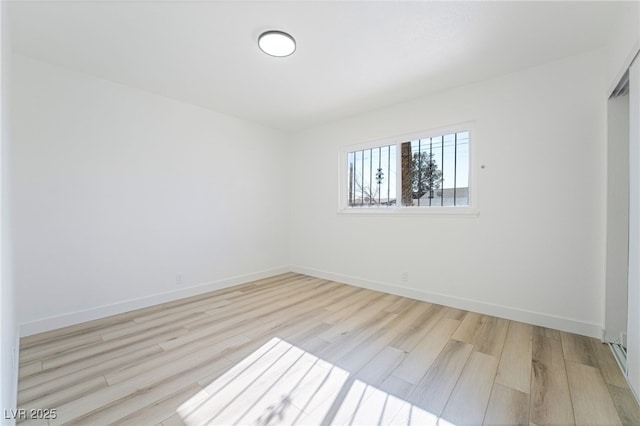 empty room with light wood-type flooring