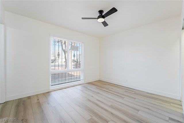 unfurnished room with light wood-type flooring and ceiling fan