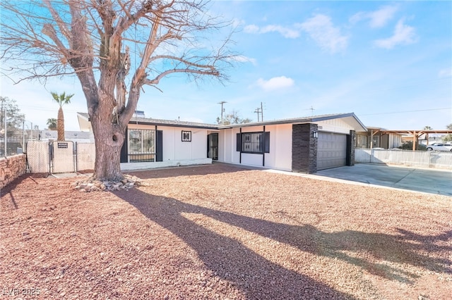 ranch-style home with a garage