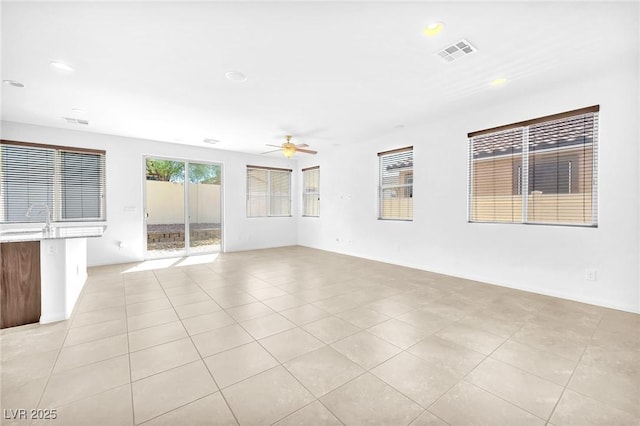 5640 Akula Bay St, North Las Vegas, NV 89081 - unfurnished room with ceiling fan, recessed lighting, and light tile patterned floors