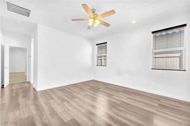 5640 Akula Bay St, North Las Vegas, NV 89081 - spare room featuring wood finished floors, ceiling fan, baseboards, and recessed lighting