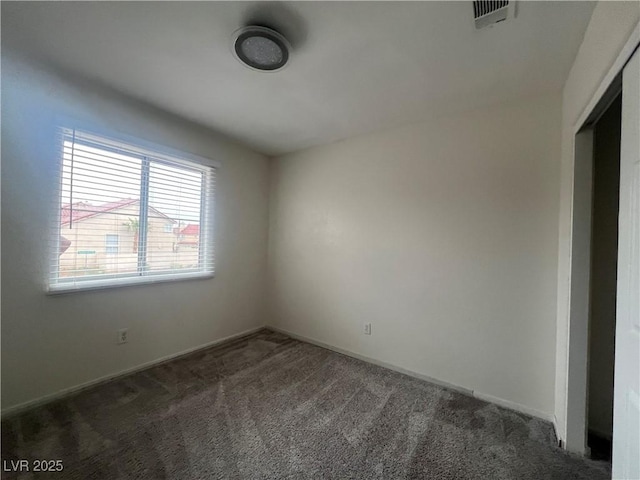 view of carpeted spare room