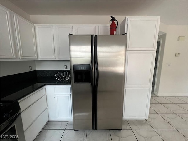 kitchen featuring white cabinets and stainless steel appliances