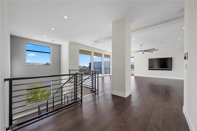 corridor with dark hardwood / wood-style floors