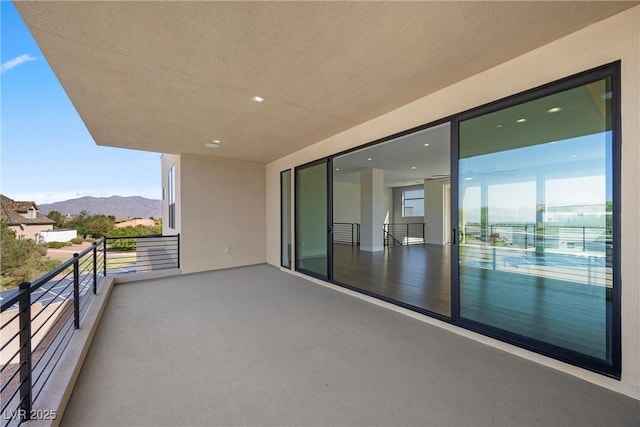 balcony featuring a mountain view