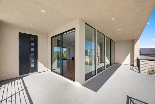 view of patio / terrace with a balcony