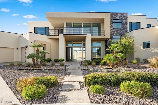 contemporary house featuring a balcony