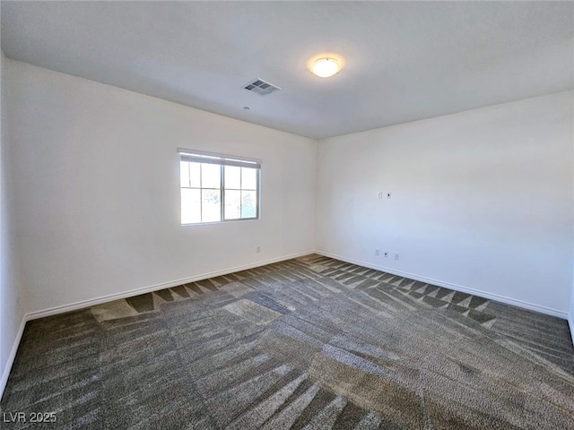 846 Star Estates Ave, North Las Vegas, NV 89086 - spare room with baseboards and dark colored carpet