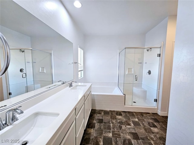 846 Star Estates Ave, North Las Vegas, NV 89086 - bathroom featuring a garden tub, a shower stall, double vanity, and stone finish flooring