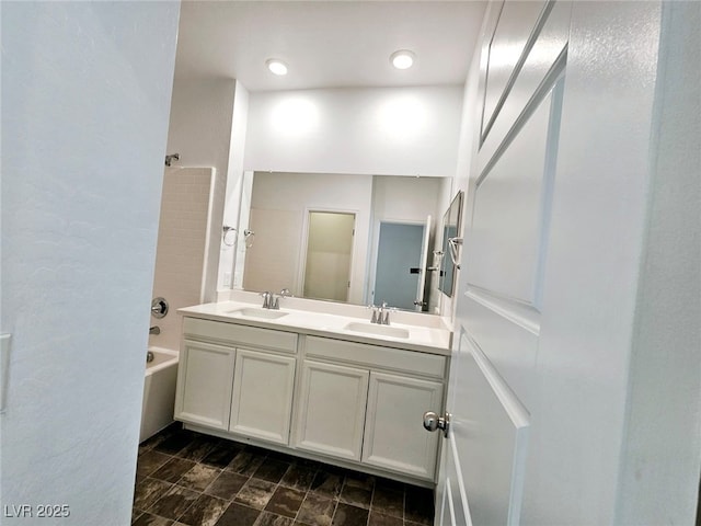 846 Star Estates Ave, North Las Vegas, NV 89086 - bathroom with double vanity and shower / bathtub combination