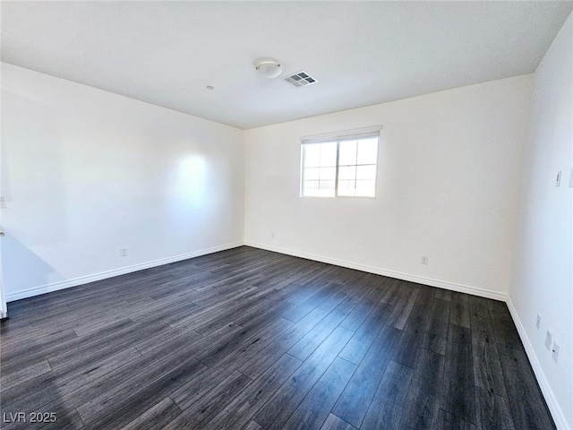 846 Star Estates Ave, North Las Vegas, NV 89086 - unfurnished room with dark wood-style floors and baseboards
