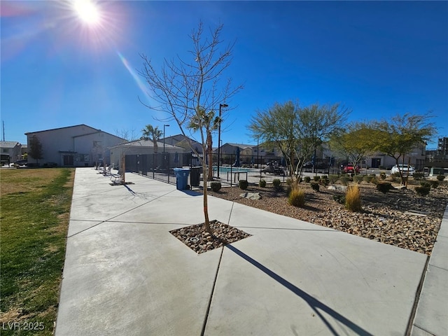 846 Star Estates Ave, North Las Vegas, NV 89086 - view of patio with a residential view, a swimming pool, and fence