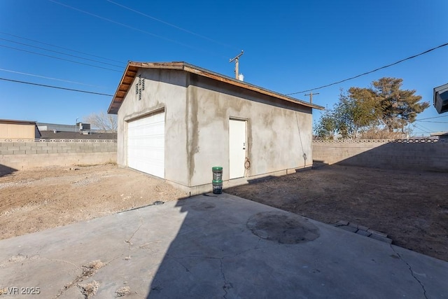 exterior space featuring a garage