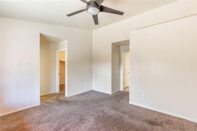 empty room with carpet floors and ceiling fan