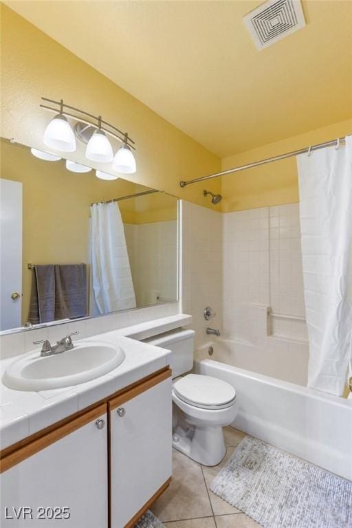 full bathroom featuring toilet, tile patterned flooring, shower / bath combo, and vanity