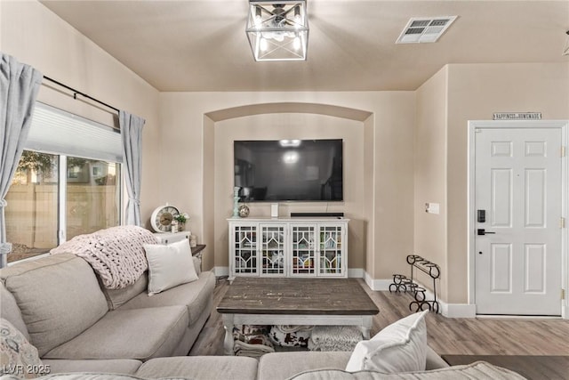 living room with wood-type flooring