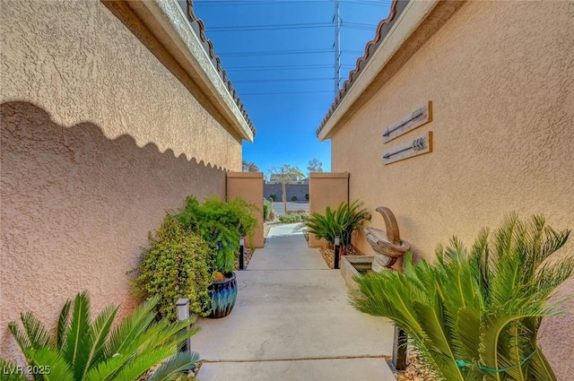 view of home's exterior with a patio