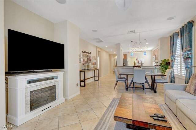 living room with light tile patterned floors